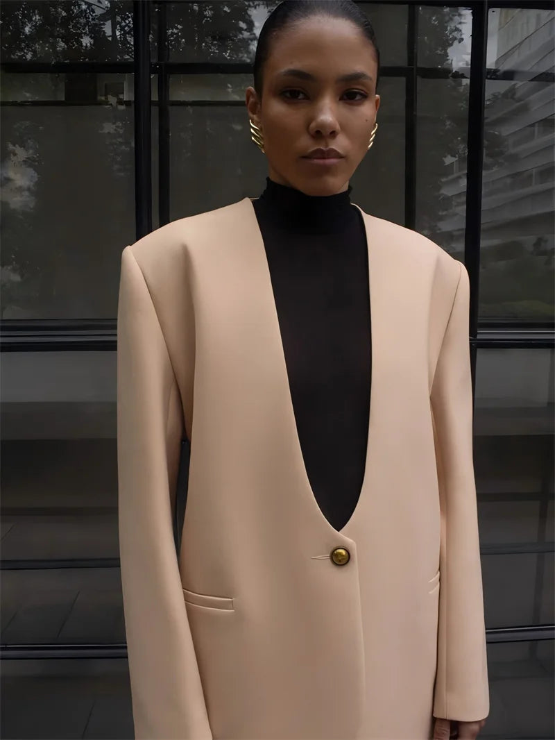 بليزر كهرماني بفتحة رقبة على شكل حرف V