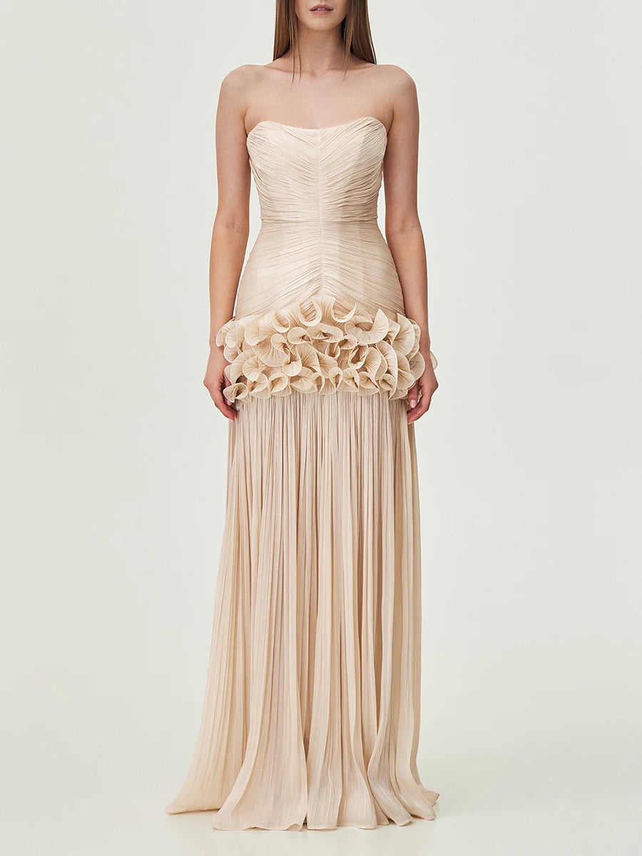 Woman wearing Teresa ruffled dress with tiered layers, front view