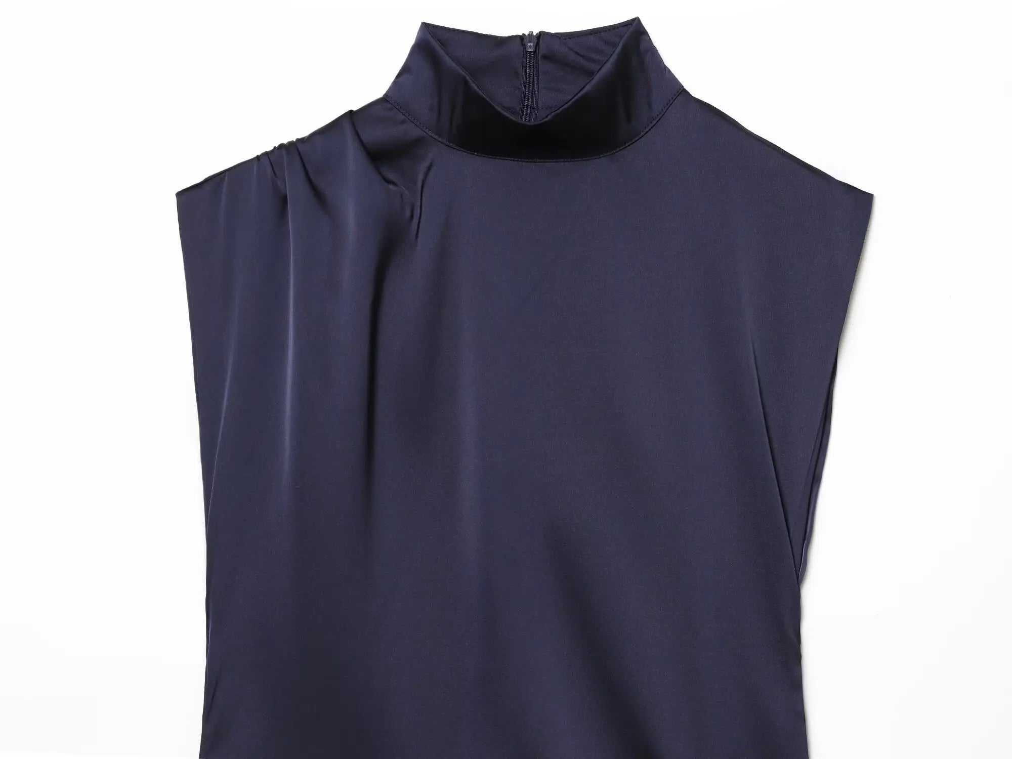 Navy sleeveless dress with lace trim on a white background