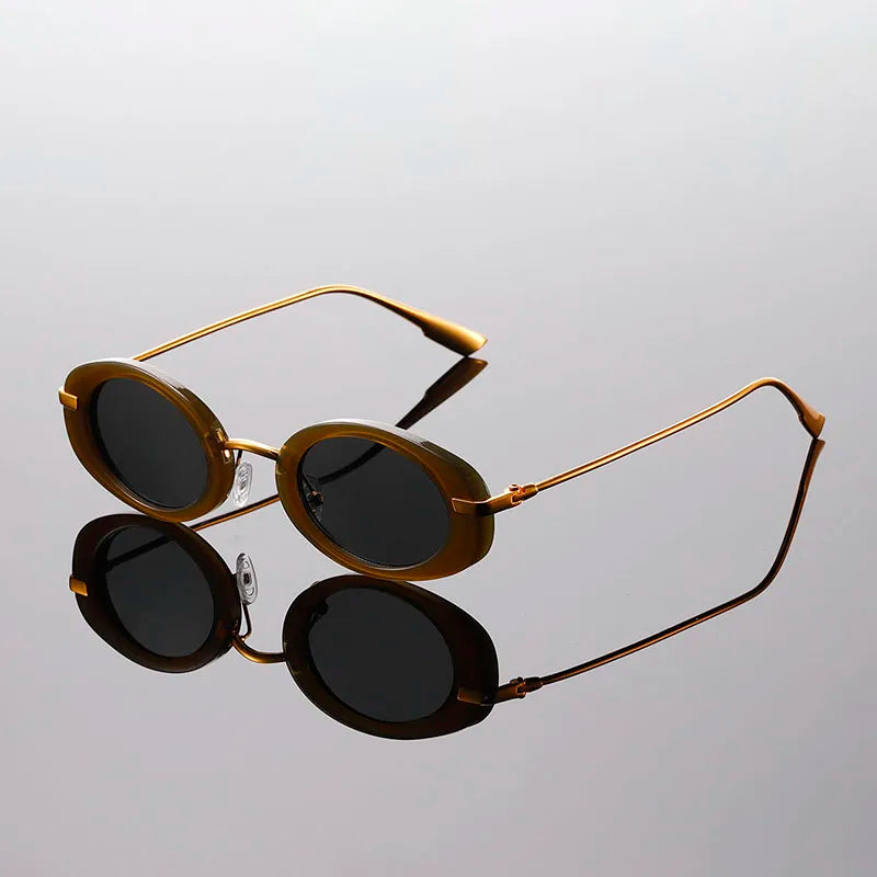 Side profile of brown retro round sunglasses showing temple design