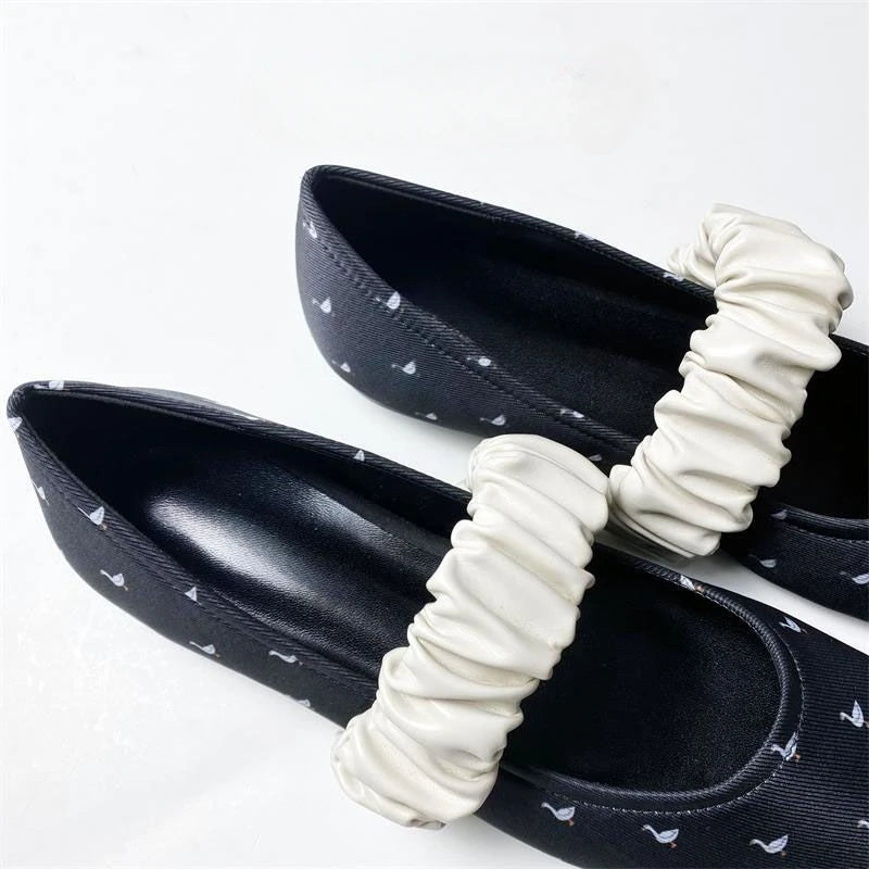 Scarpe ballerine con stampa cigno