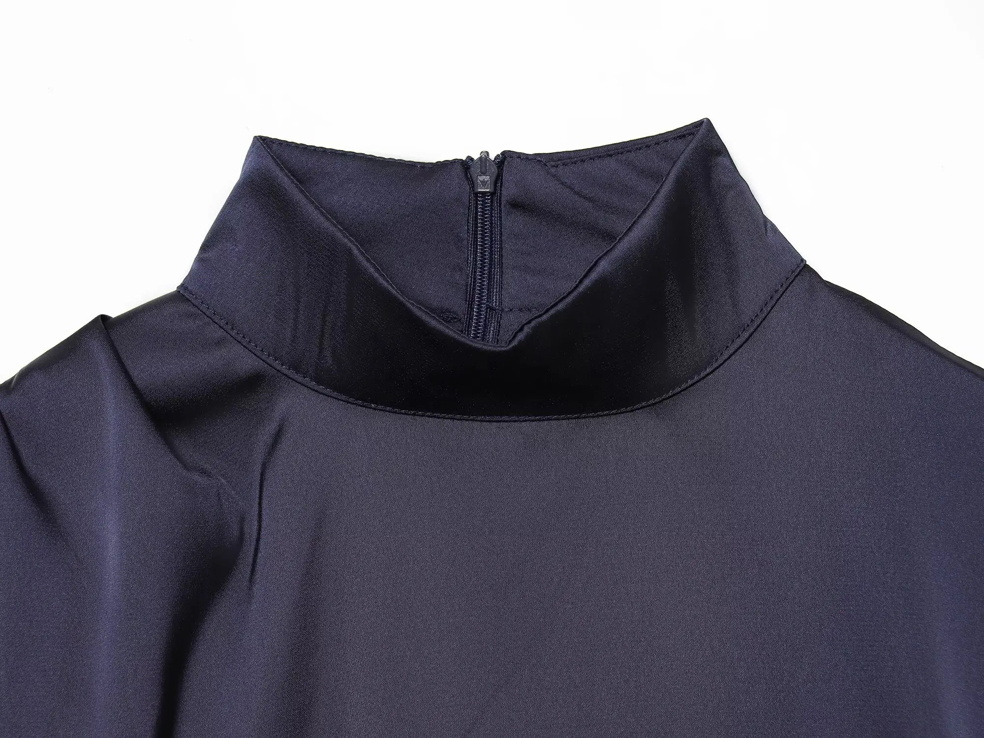 Navy sleeveless dress with lace trim on a white background