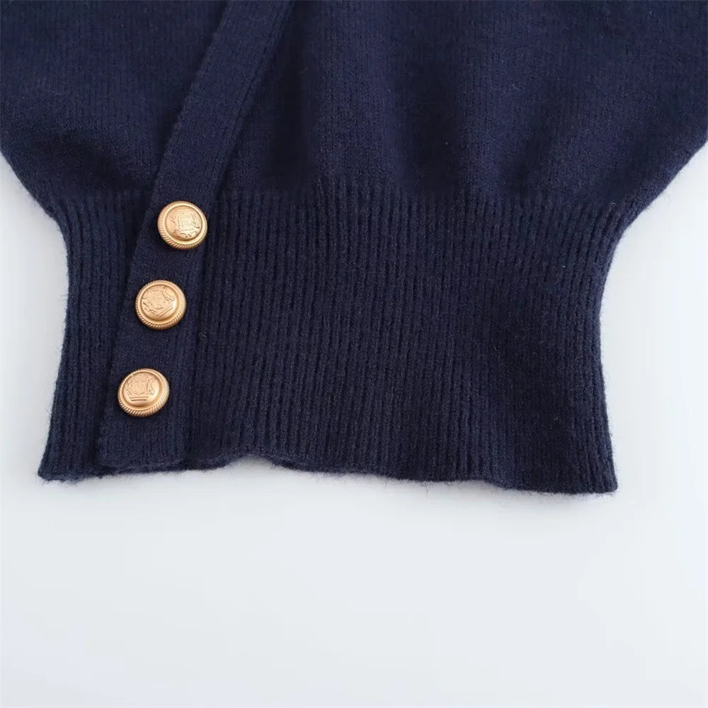 Maglione lavorato a maglia con papillon retrò