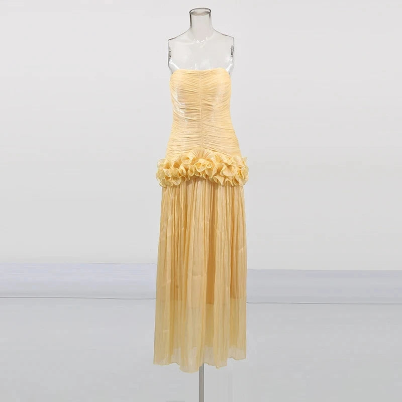 Woman in Teresa ruffled dress showing movement and drape