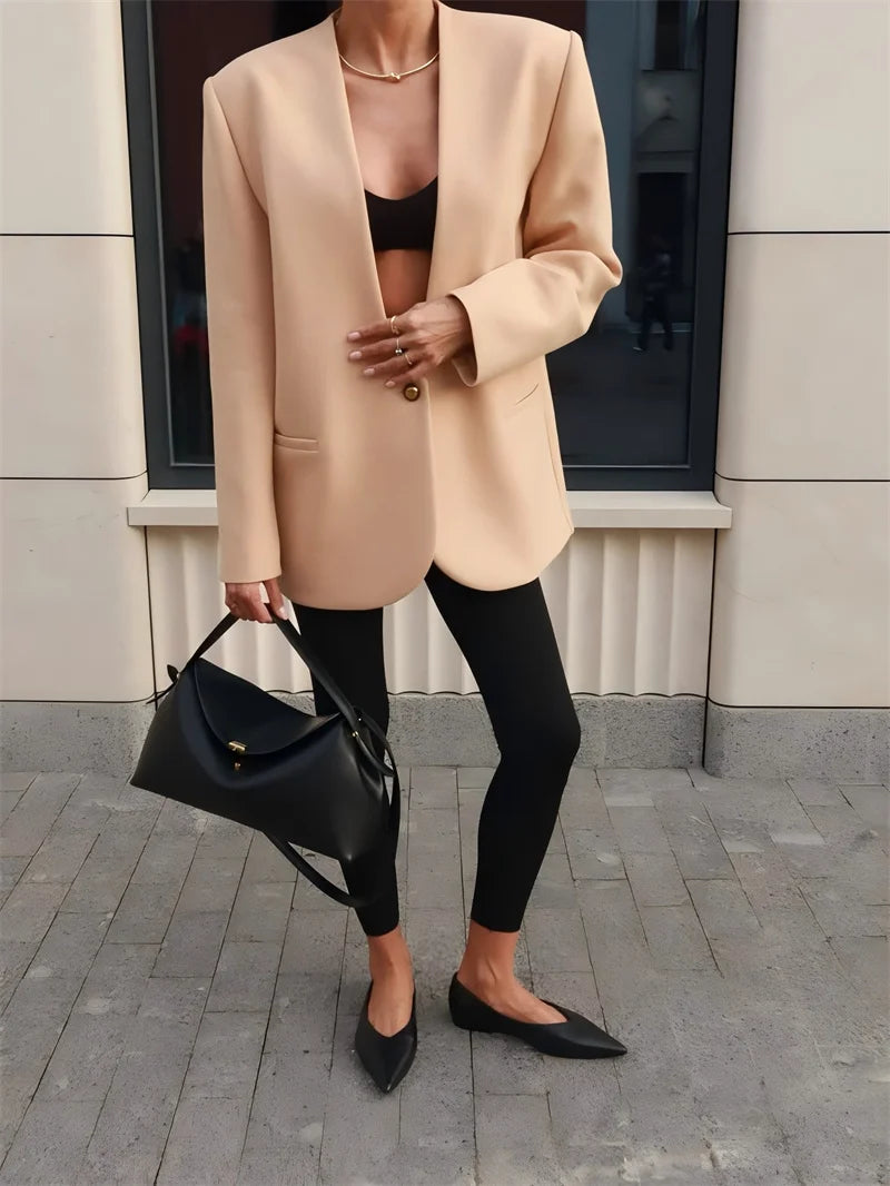 بليزر كهرماني بفتحة رقبة على شكل حرف V