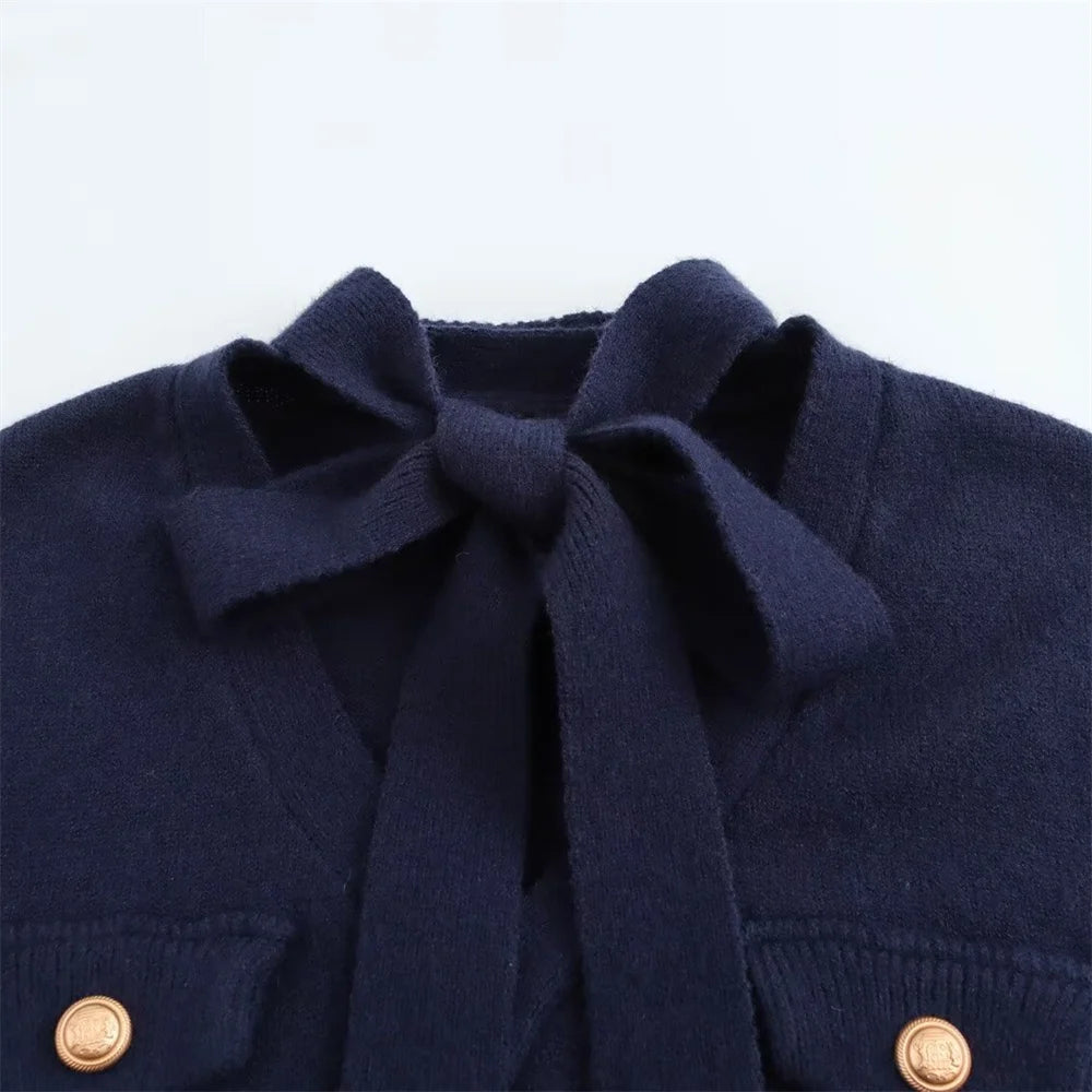 Maglione lavorato a maglia con papillon retrò