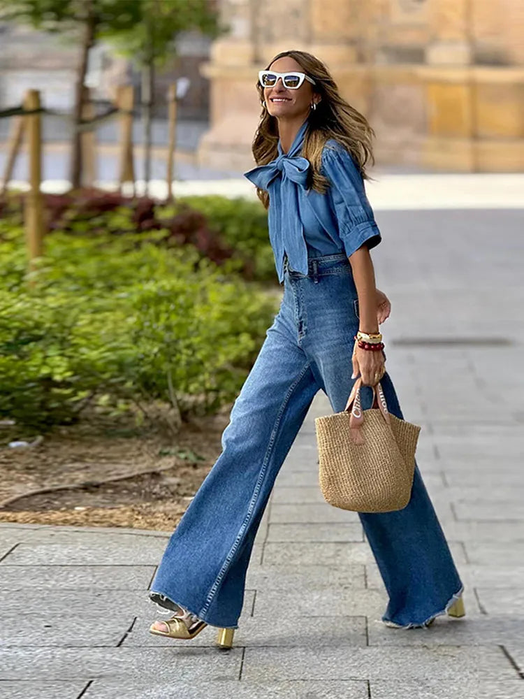 Side angle of woman in Keira denim shirt showing silhouette