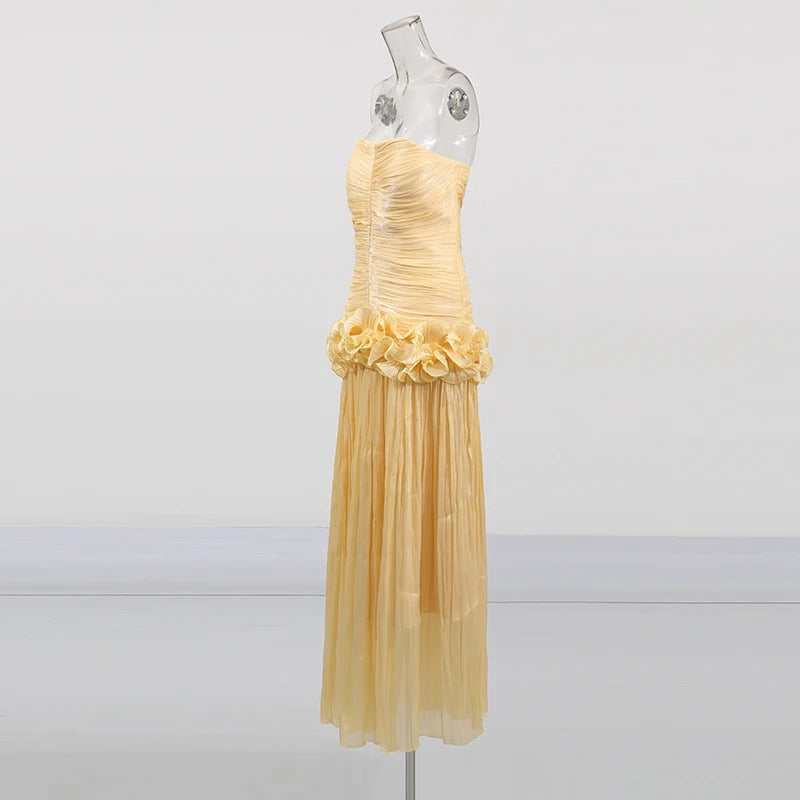 Close-up of ruffle detail and fabric texture on Teresa dress