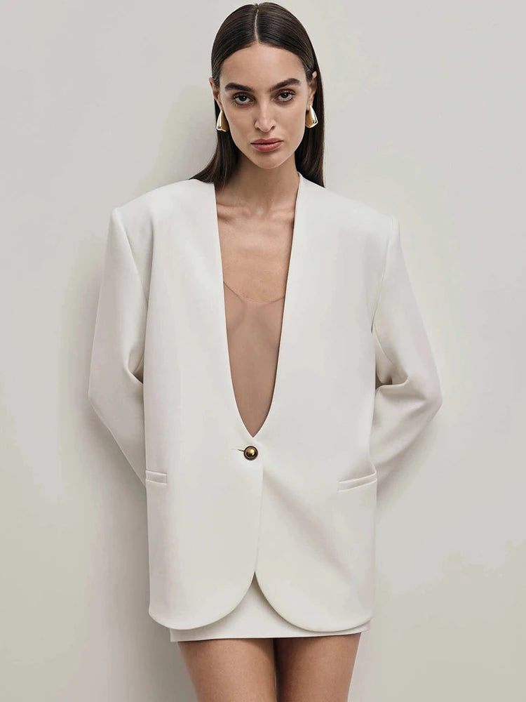 بليزر كهرماني بفتحة رقبة على شكل حرف V