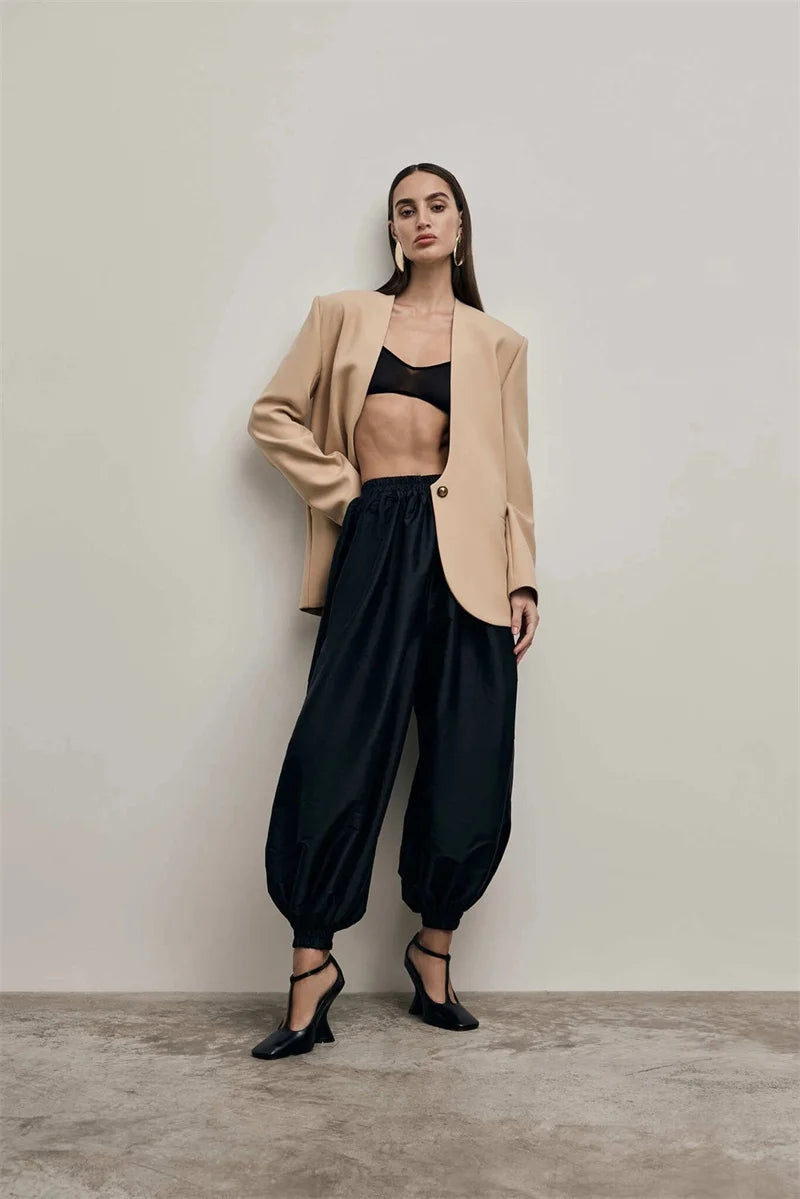 بليزر كهرماني بفتحة رقبة على شكل حرف V