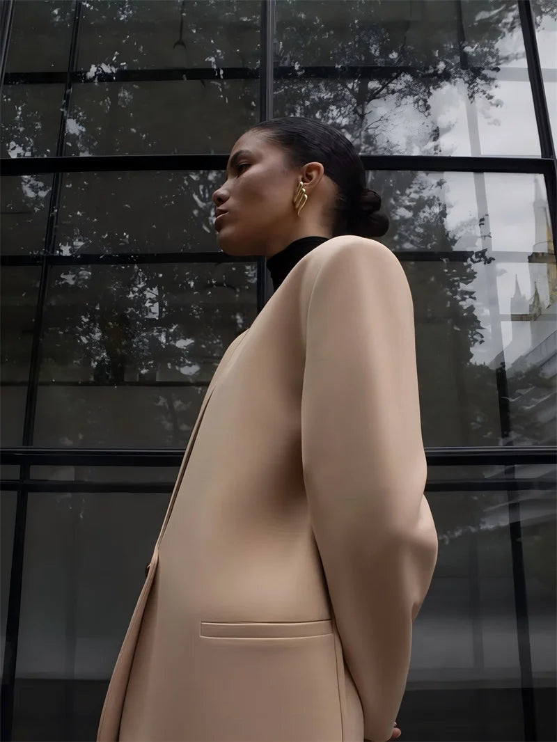 بليزر كهرماني بفتحة رقبة على شكل حرف V