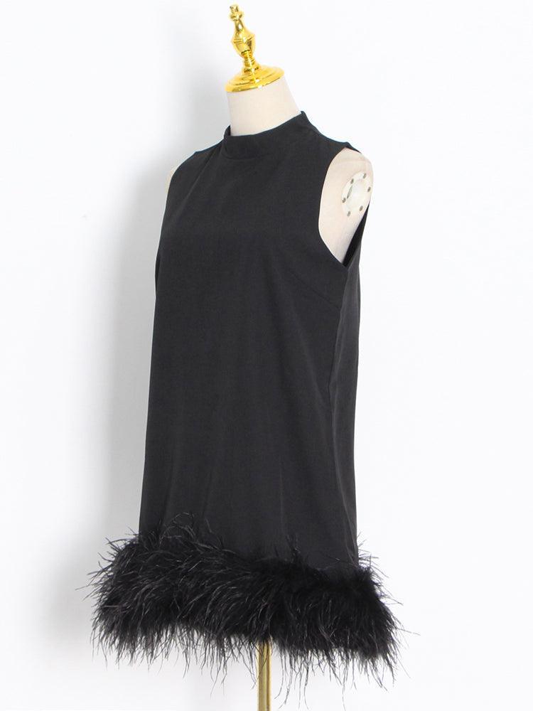 Kelsie Loose Feather Dress from The House of CO-KY - Dresses